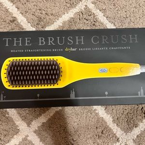 Drybar heated straightening brush.